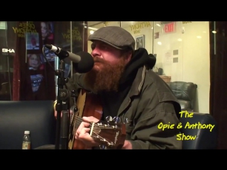 mustard's homeless man sings radiohead's "creep" with a guitar